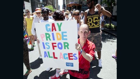A SAGE supporter at the New York gay pride parade in June. SAGE works to improve conditions for older LGBT people.