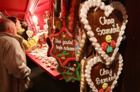 Jewish bakers are busy with more than just doughnuts and latkes during this time of year. Here, traditional gingerbread hearts and Stars of David with Hebrew inscriptions in Latin letters on them hang at a stall at the annual Hanukkah market at the Berlin Jewish Museum. 