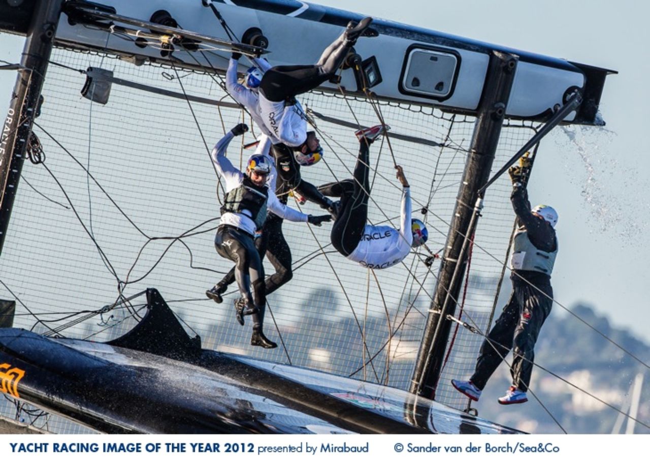 Team USA capsize during the America's Cup in this dramatic image by photographer Sander van der Borch. The team went on to win the prestigious race. 