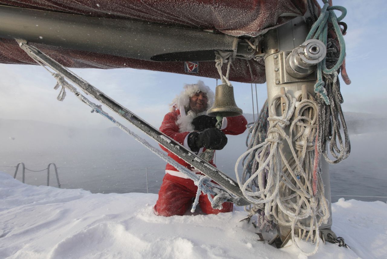 Valery Kokoulin, 47, rings a bell on his yacht to mark the end of the sailboat season on Friday, December 7, on the Yenisei River outside Krasnoyarsk, Russia. Temperatures in the Siberian city dipped to minus 9.4 degrees Fahrenheit.