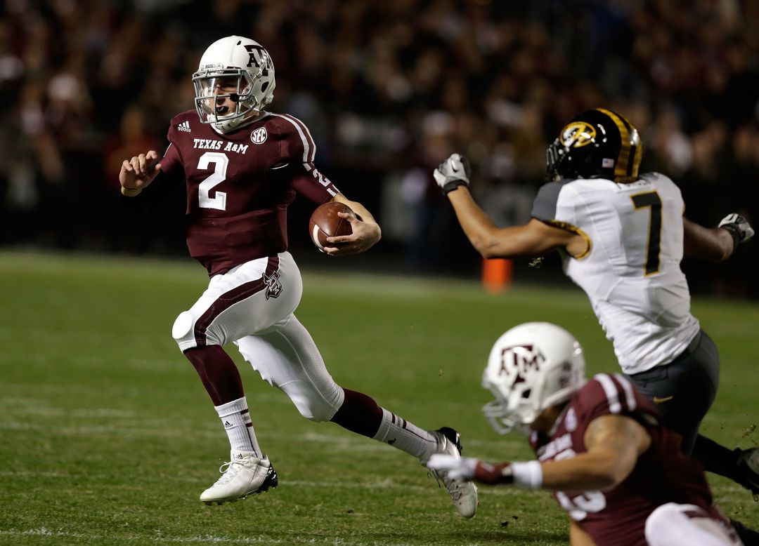 Manziel rushes for a gain during the game against the Missouri Tigers at Kyle Field on November 24 in College Station, Texas.
