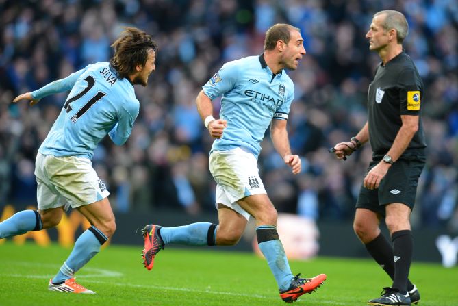 Pablo Zabaleta, right, fired an equalizer in the 86th minute to give second-placed City hope of extending a 21-game unbeaten league run that went back to last season's title-winning climax.