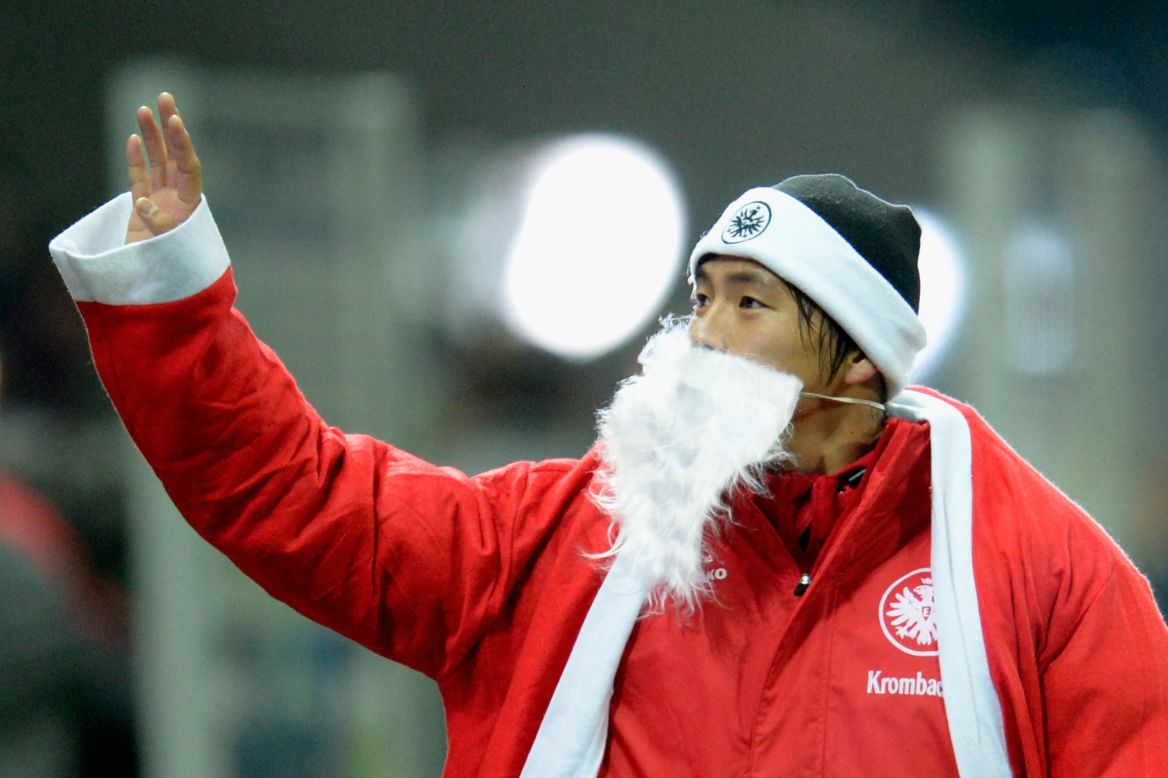 Takashi Inui of Frankfurt, Germany, celebrates dressed as Santa Claus after the Bundesliga match between Eintracht Frankfurt and SV Werder Bremen on December 8 in Frankfurt am Main, Germany. Eintracht won 4-1.