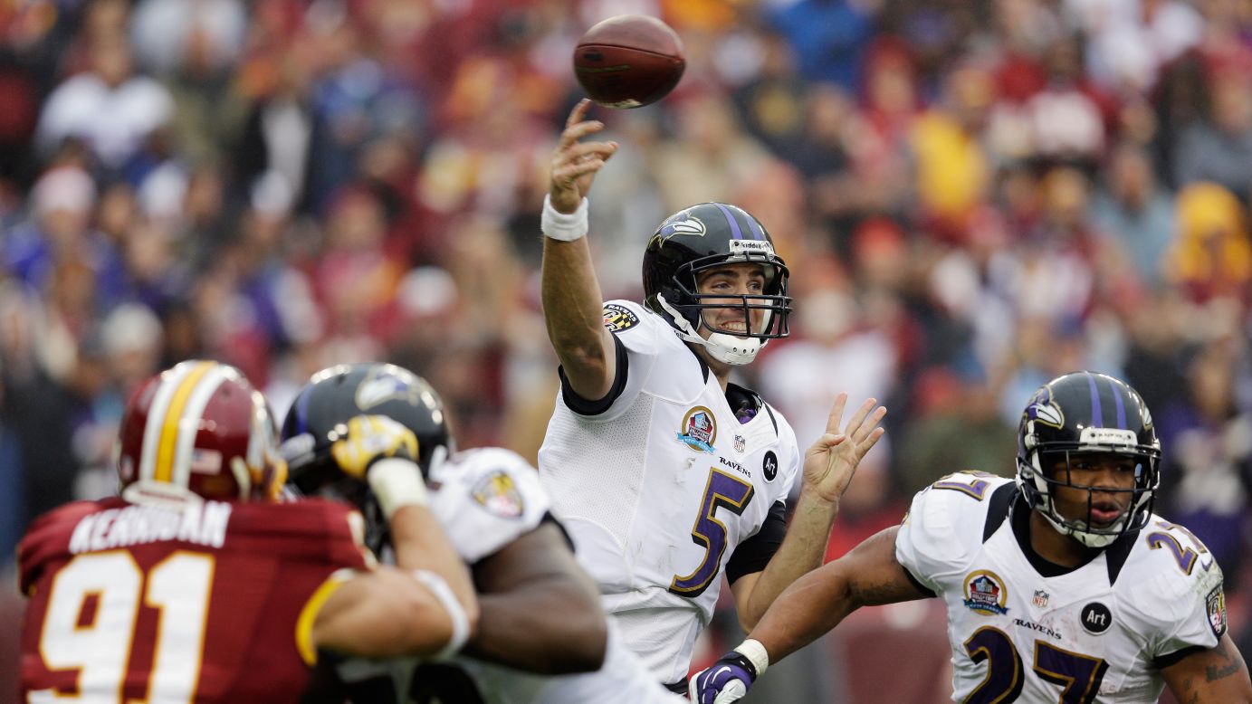 Ravens quarterback Joe Flacco throws a pass during the first half against the Washington Redskins on Sunday.