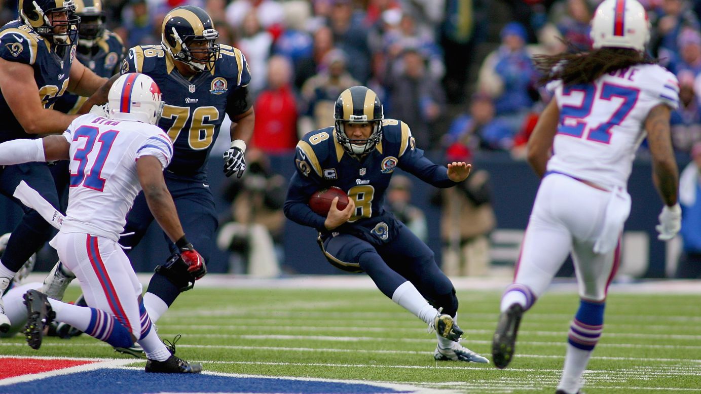 Rams quarterback Sam Bradford scrambles against the Bills on Sunday.