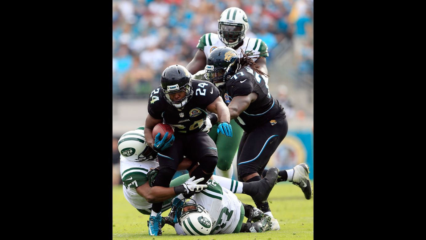 Montell Owens of the Jaguars runs for yardage during the game against the New York Jets on Sunday.