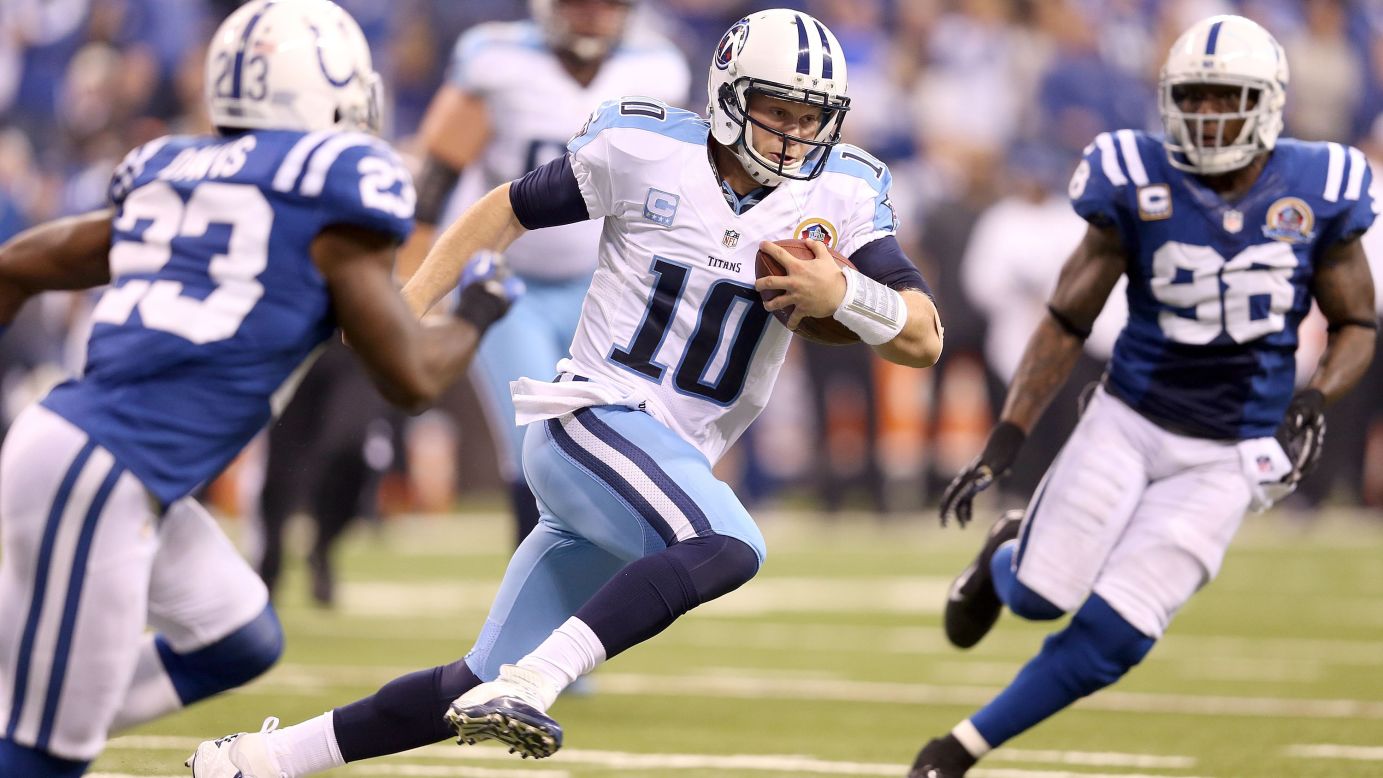 Titans quarterback Jake Locker runs with the ball against the Colts on Sunday.