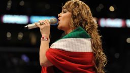 LOS ANGELES, CA - SEPTEMBER 18: Jenny Rivera sings the Mexican national anthem before the Middleweight bout against Shane Mosley and Sergio Mora at Staples Center on September 18, 2010 in Los Angeles, California.  (Photo by Harry How/Getty Images)