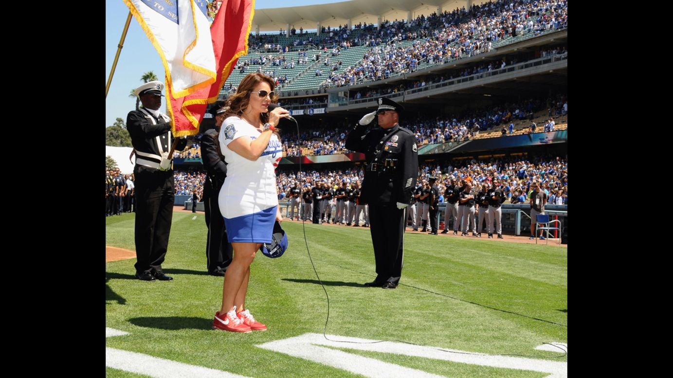 Rivera sings the national anthem at Dodger Stadium in Los Angeles in August 2012. 