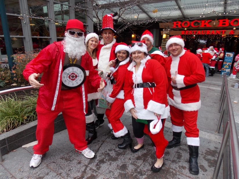 <a href="http://ireport.cnn.com/people/gregreesehd">Greg Reese</a> photographed these costumed attendees of Santacon 2012 in Cincinnati, Ohio. "It's an annual event where they dress up like Santa and other holiday icons and walk around the city giving candy and [going on] pub crawls," he said.