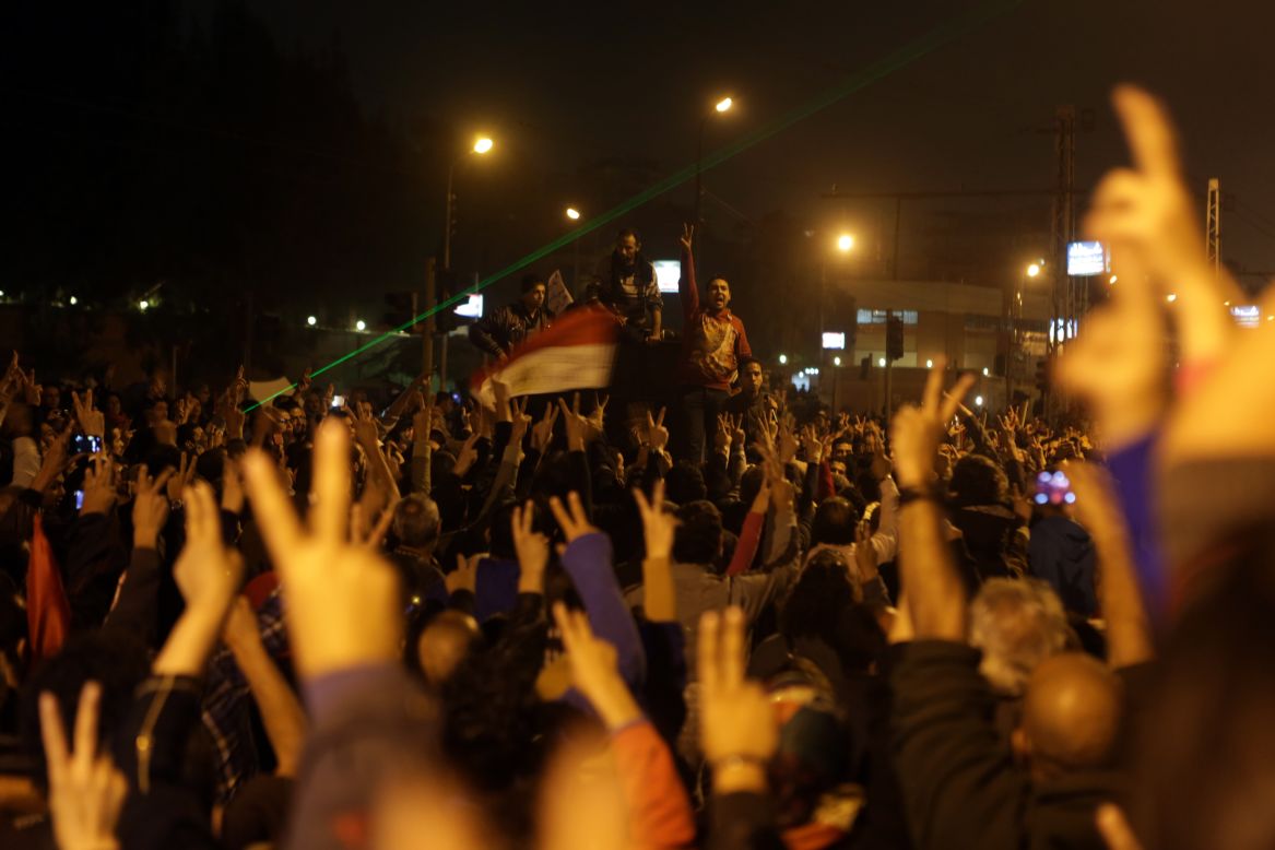 Members of the Egyptian opposition gather for a protest outside the presidential palace on Sunday, December 9, in Cairo. The palace has been the scene of violent clashes pitting thousands of protesters -- for and against Morsy.