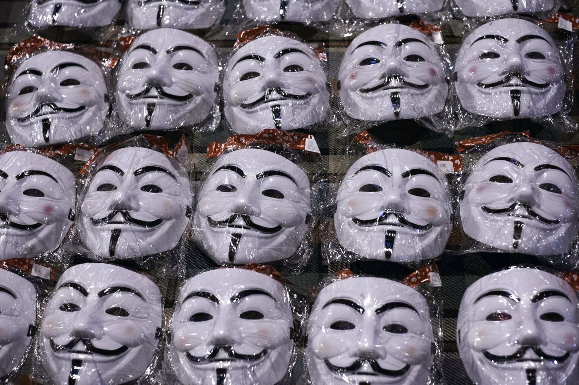 Guy Fawkes masks are displayed by a street vendor in front of the Egyptian presidential palace in Cairo on December 9. The masks depict Fawkes, a rebel executed in England's Gunpowder Plot seeking to blow up the House of Lords in the early 1600s.