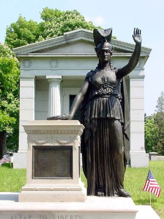 The American Revolution's Battle of Brooklyn was fought on the cemetery's grounds on August 27, 1776.  While many soldiers were buried where they fell, there are no revolutionary war-era graves in Green-Wood. This statue of the Roman goddess Minerva commemmorates the Battle of Brooklyn.  Unveiled in 1920, it has a direct line of sight to the Statue of Liberty.  In fact, the two statues are said to be saluting each other.