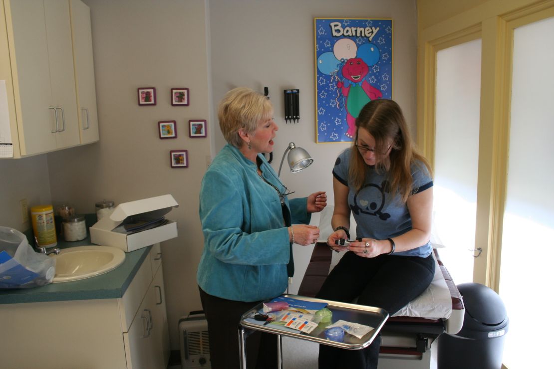 Volunteer diabetes educator B.J. Cline and patient Katie Lipsey at a Church Health Center clinic.