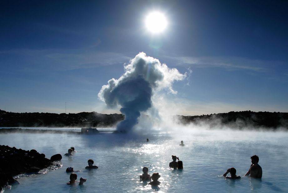 Tourists bathe in the famous Blue Lagoon just outside Reykjavik. The natural hot-water springs are one of the country's leading tourist attractions. 