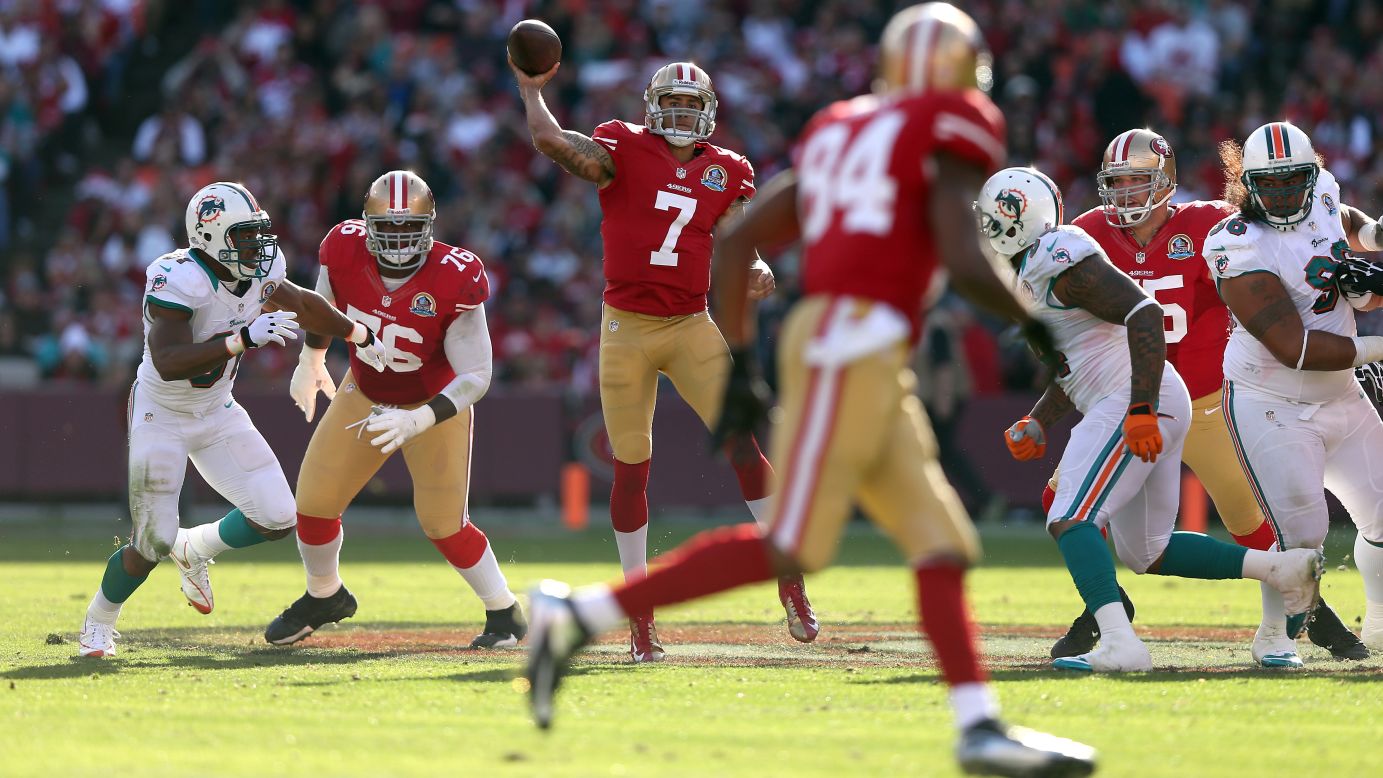 49ers quarterback Colin Kaepernick passes against the Dolphins on Sunday.