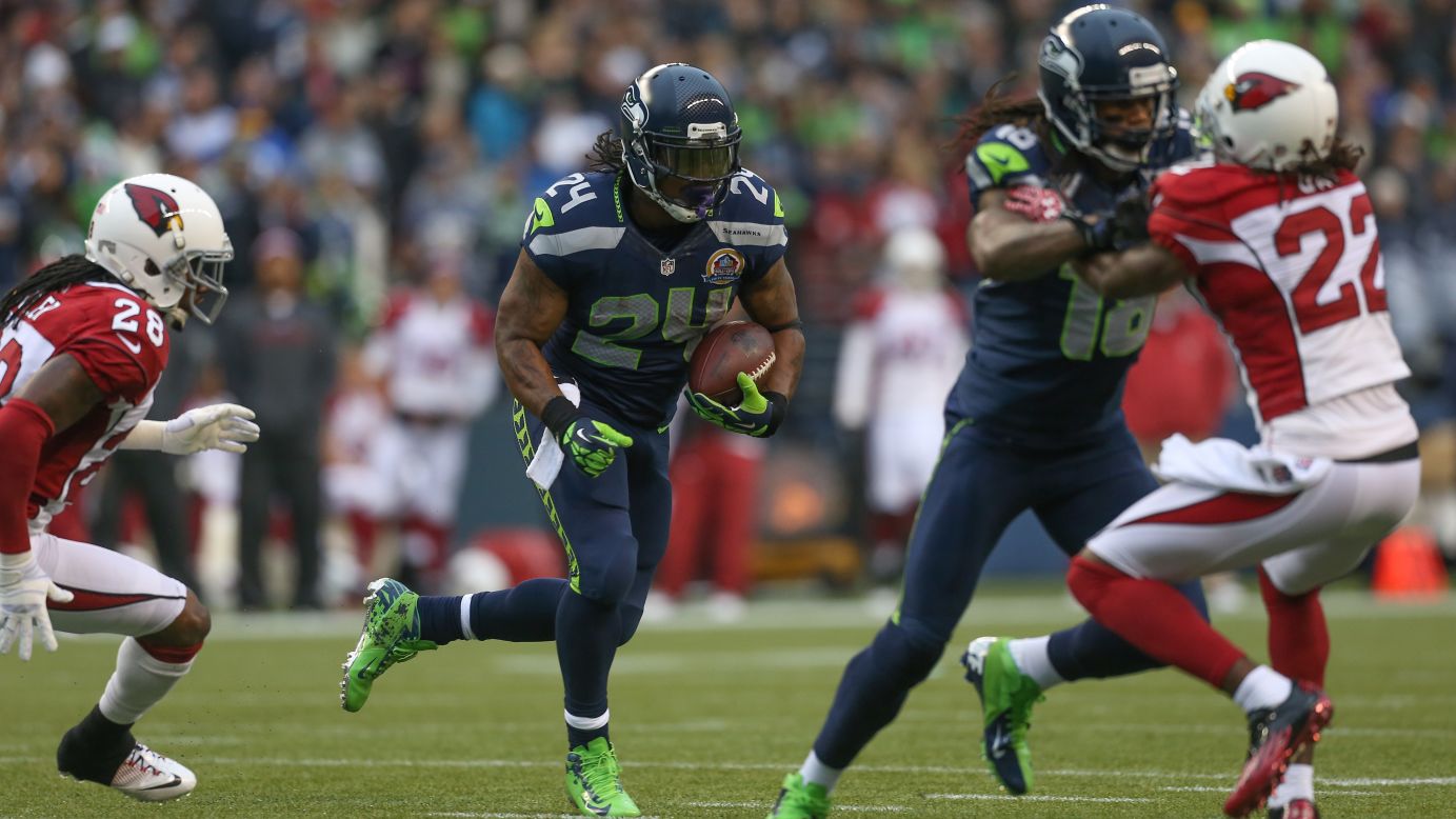 Running back Marshawn Lynch of the Seahawks rushes for a touchdown against the Cardinals on Sunday.