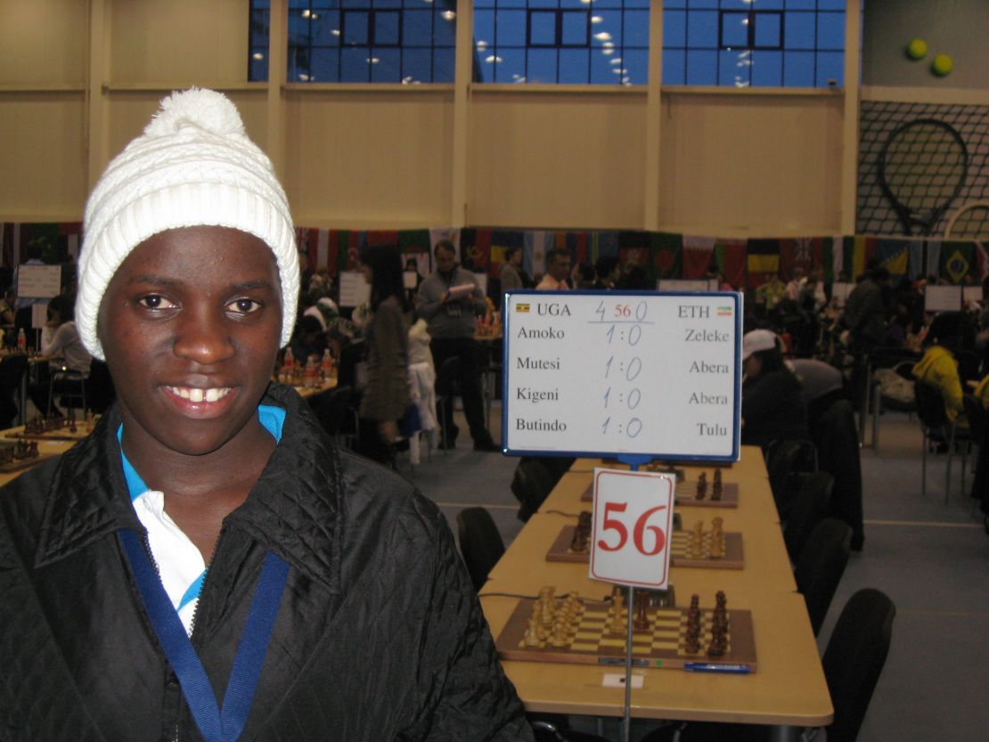 Ugandan chess sensation Phiona Mutesi relishes her first victory at the 2010 Chess Olympiad in Khanty-Mansiysk, Russia