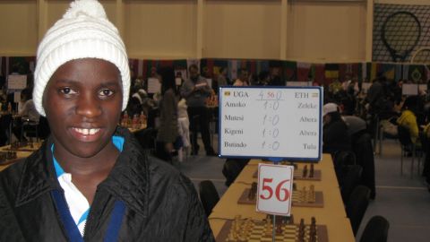 Ugandan chess sensation Phiona Mutesi relishes her first victory at the 2010 Chess Olympiad in Khanty-Mansiysk, Russia