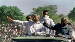 Mandela and Zambian President Kenneth Kaunda arrive at an ANC rally on March 3, 1990, in Lusaka, Zambia. Mandela was elected president of the ANC the next year.