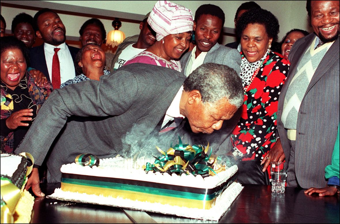 At his Soweto home on July 18, 1990, Mandela blows out the candles on his 72nd birthday cake. It was the first birthday he celebrated as a free man since the 1960s.