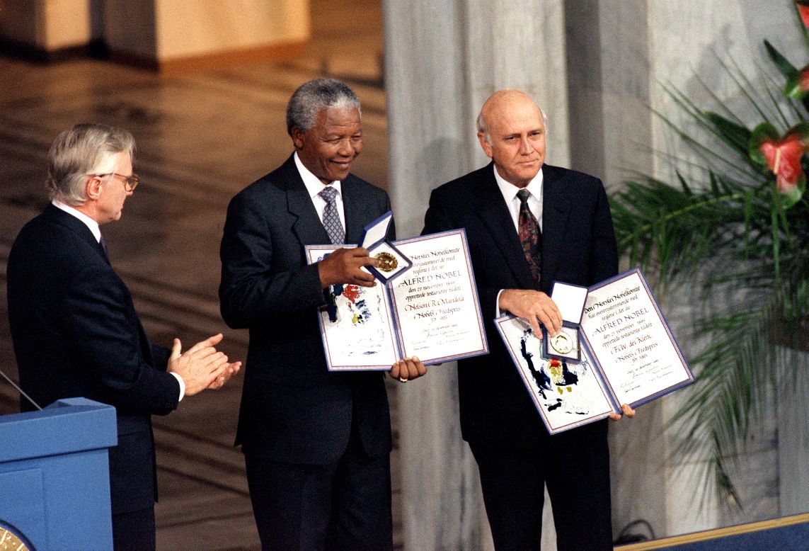 South African President Frederik de Klerk, right, and Mandela shared a Nobel Peace Prize in 1993 for their work to secure a peaceful transition from apartheid rule.