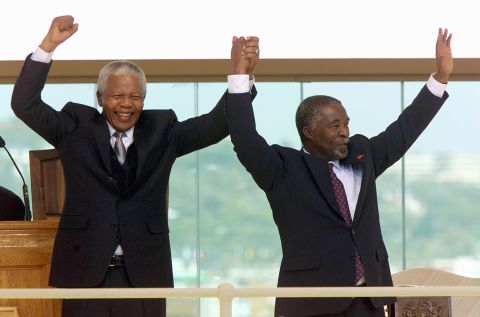 After one term as president, Mandela stepped down. Thabo Mvuyelwa Mbeki, at right, was sworn in as his replacement in June 1999.