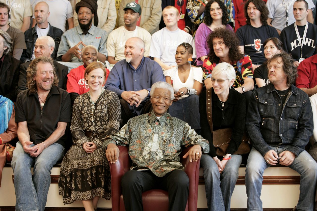 The "46664 Arctic" benefit concert was held in Tromso, Norway, on June 11, 2005. 46664 was Mandela's identification number in prison. Here, artists who performed at the event surround him.