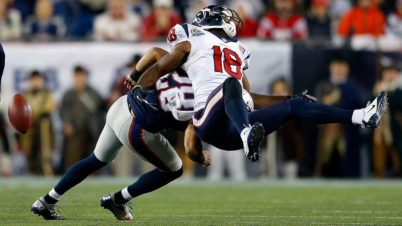 Steve Gregory of the New England Patriots breaks up a pass intended for Lestar Jean of the Houston Texans on Monday.