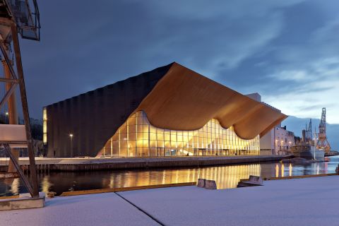 The Kilden Theatre overlooks the harbour of Kristiansand in Norway. Its bold sculptural ceiling was designed using techniques from traditional boat construction.