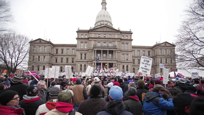 LANSING, MI, - DECEMBER 11: Union members from around the country rally at the Michigan State Capitol to protest a vote on Right-to-Work legislation December 11, 2012 in Lansing, Michigan. Republicans control the Michigan House of Representatives, and Michigan Gov. Rick Snyder has said he will sign the bill if it is passed. The new law would make requiring financial support of a union as a condition of employment illegal. (Photo by Bill Pugliano/Getty Images)