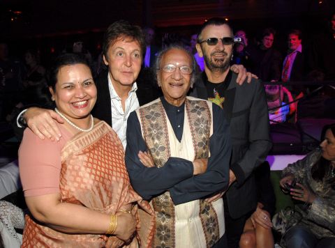 Shankar's wife, Sukanya Shankar, poses with her husband and Beatles Paul McCartney and Ringo Starr. 