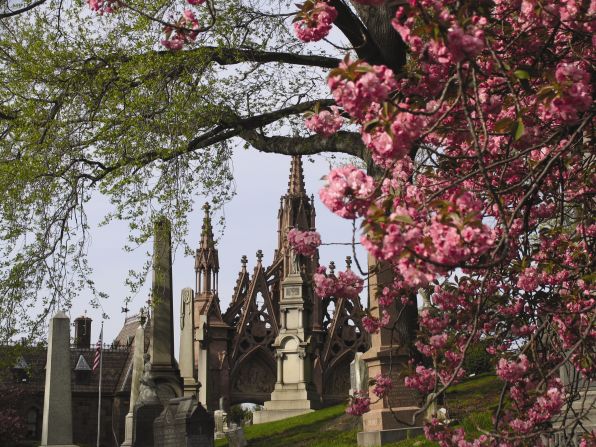 A gothic-style arch marks the entrance to Brooklyn's Green-Wood Cemetery, home to nearly 600,000 grave sites, including infamous politicians, sports figures and inventors. Here's a look at the 175-year-old burial grounds, which sustained some damage this fall during Superstorm Sandy:  