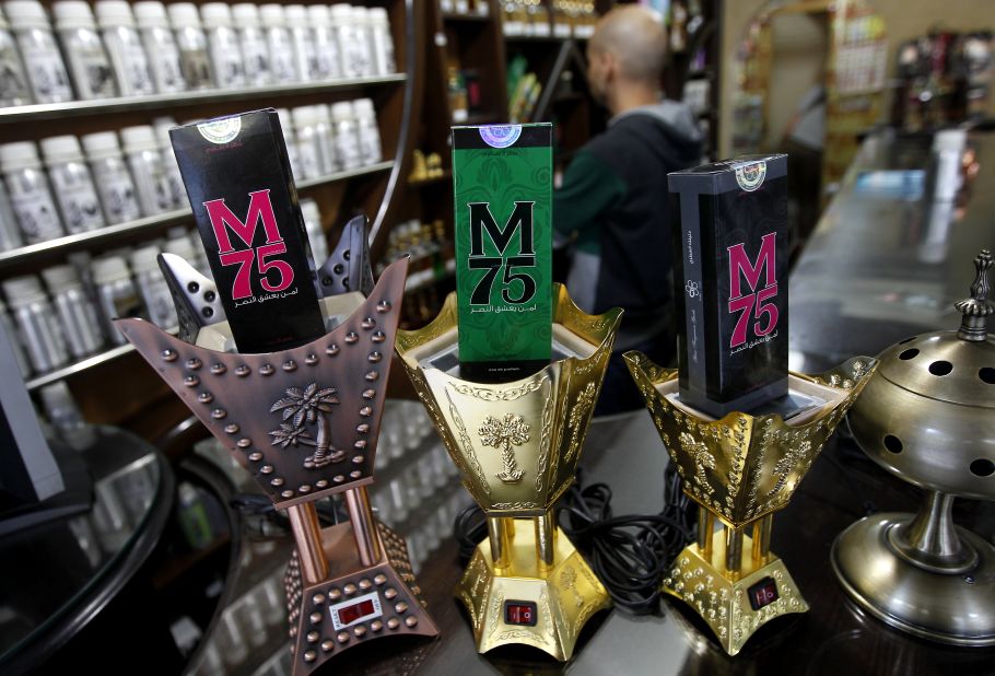 The perfume comes in different versions for men and women, and is marketed with the slogan: "Whoever loves victory, happiness and dignity, loves the M75 perfume."