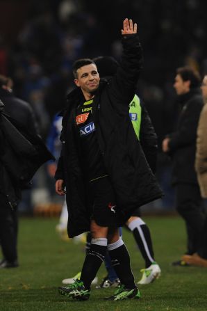 Udinese captain Antonio Di Natale salutes the sole traveling fan after the match, having scored in his team's 2-0 win at Stadio Luigi Ferraris in Genoa.