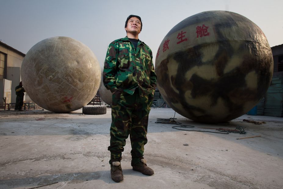 Chinese villager Liu Qiyuan, pictured here on December 11, has constructed six survival pods that can be used in the event of tsunamis and earthquakes. 