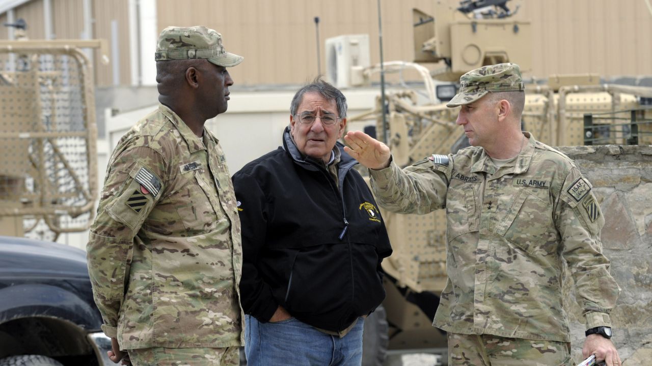 U.S. Defense Secretary Leon Panetta, center, visits Afghanistan's Kandahar airfield Thursday.