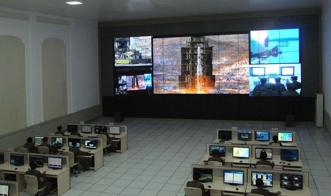 This picture from North Korea's Korean Central News Agency on December 12 shows the rocket Unha-3 being monitored at a satellite control center in North Korea.