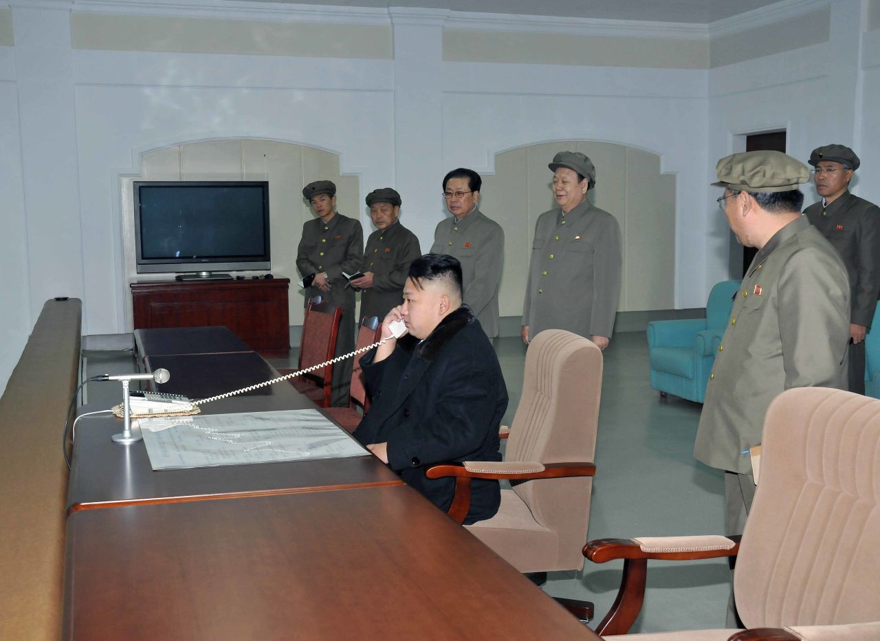 Kim Jong Un monitors the rocket launch from a room at North Korea's satellite control center in Cholsan County.