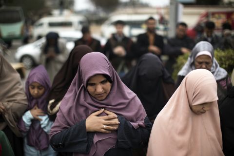 Women pray during a demonstration in support of President Mohamed Morsy in Cairo on December 14.