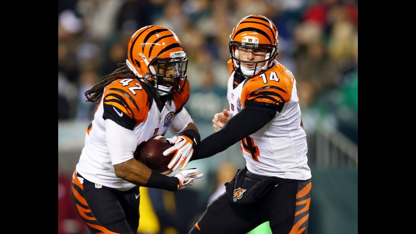 Andy Dalton of the Cincinnati Bengals hands the ball off to BenJarvus Green-Ellis in the first quarter against the Philadelphia Eagles on December 13.