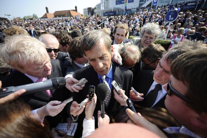 A media scrum surrounds Frankel's trainer, Henry Cecil. The celebrity racing figure is "hugely loved" by the public, according Bazalgette. 