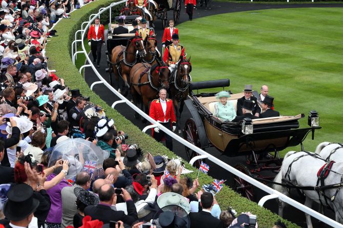 The crowd is a sea of camera phones as the Queen arrives at Ascot for the Jubilee Stakes. Celebrity horse owners such as the royal family, entertainers Ant and Dec and actress Judi Dench have helped raise the profile of the sport. 