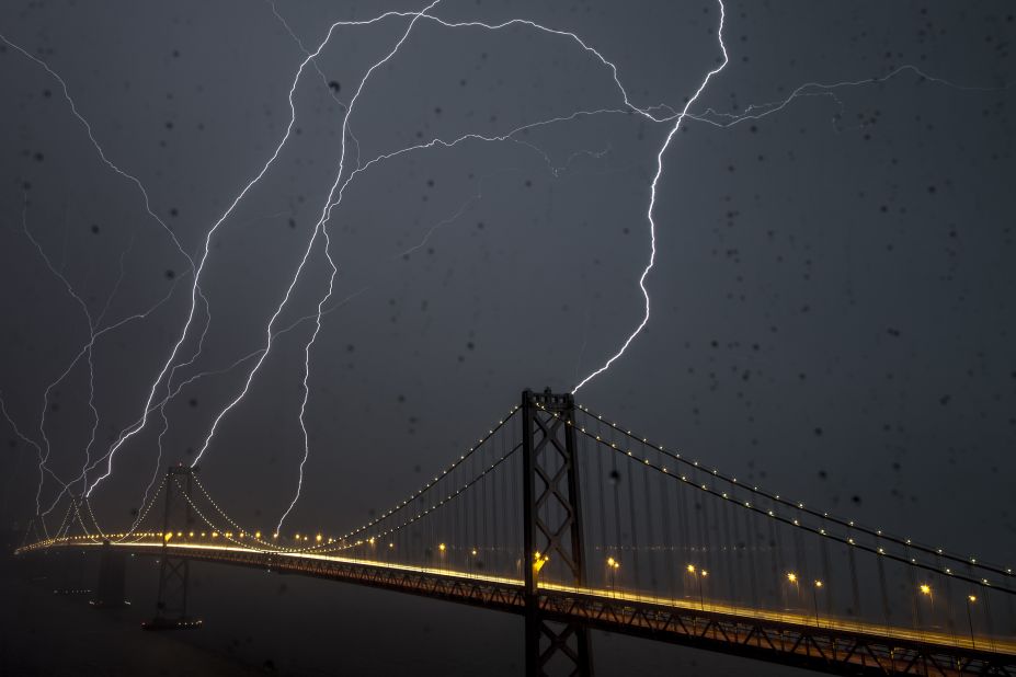 <a href="http://ireport.cnn.com/docs/DOC-890265">Phil McGrew</a> kept his camera going for an hour and a half as a storm passed over San Francisco's Bay Bridge in April 2012. He shot this 20-second exposure through a rain-soaked window. "Lightning is rare here, but I always thought it (the bridge) would be a pretty good target for lightning," he said.