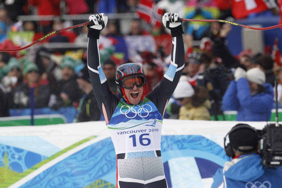 Svindal celebrates his silver medal in the men's downhill in Vancouver. He also won bronze in the giant slalom to complete a full set of medals in one Games. 