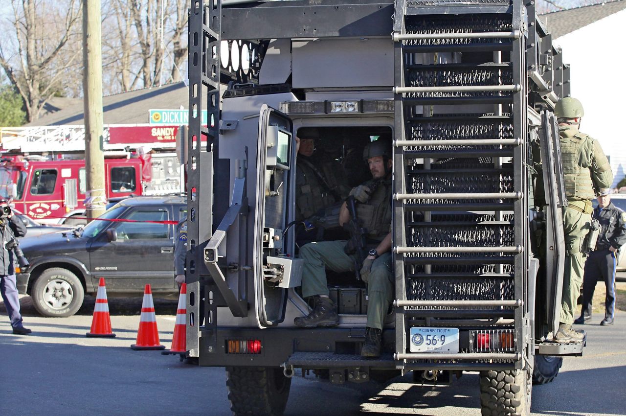 Connecticut State Troopers arrive on the scene outside Sandy Hook Elementary School on December 14.