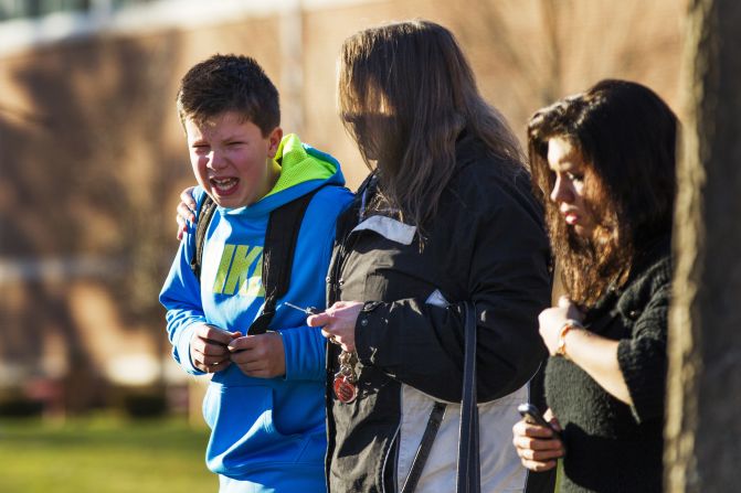 A boy weeps at Reed Intermediate School after getting news of the shooting at Sandy Hook Elementary School on December 14.