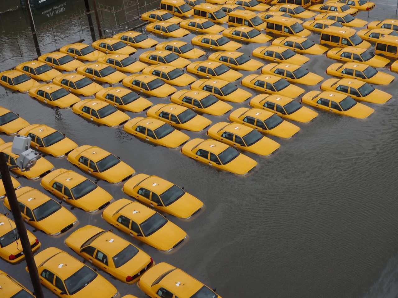 A fleet of taxi cabs sat submerged in a flooded parking lot in <a href="http://ireport.cnn.com/docs/DOC-868854">Hoboken, New Jersey</a>, after Superstorm Sandy hit the area in October. Photographer Jonathan Otto said, "The picture was taken from the 14th street viaduct looking over the corner of Jefferson and 14th street, where it appears New York stores new cabs."