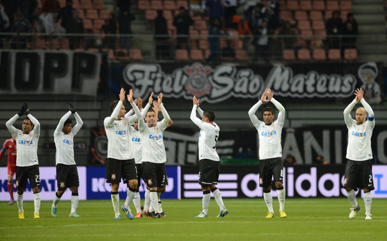 After the 1-0 semifinal win over Ah-Ahly, the Corinthians players applaud their travelling fans in the Toyota stadium