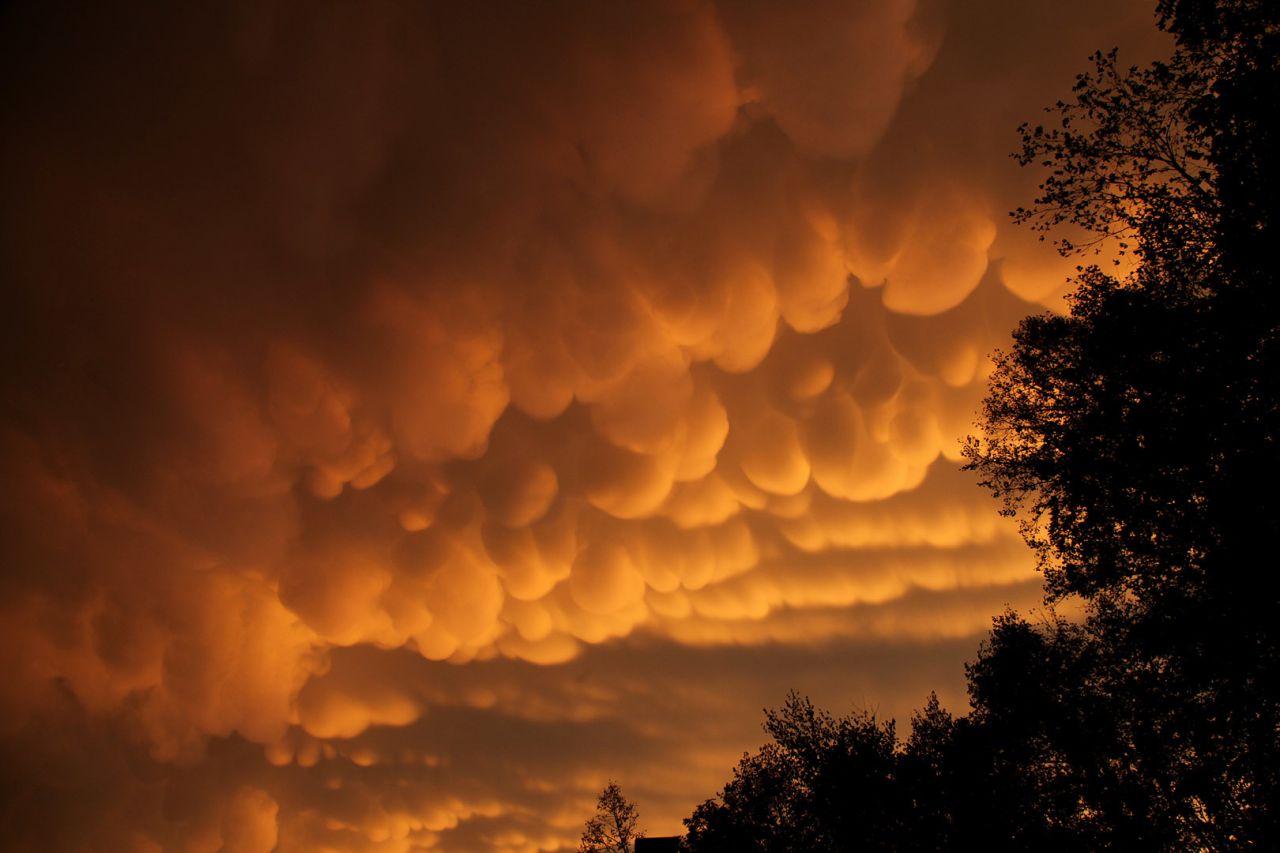 Rare cloud formations, called <a href="http://ireport.cnn.com/docs/DOC-837418">mammatus</a>, were spotted in La Crosse, Wisconsin in September. The name "mammatus" comes from the Latin word manna, or breast. "After the storms rumbled through, I saw a yellow orange glow out the window," said Jim Jorstad. "I then grabbed my camera, began driving several miles up the hill, stopping to take photos along the way."
